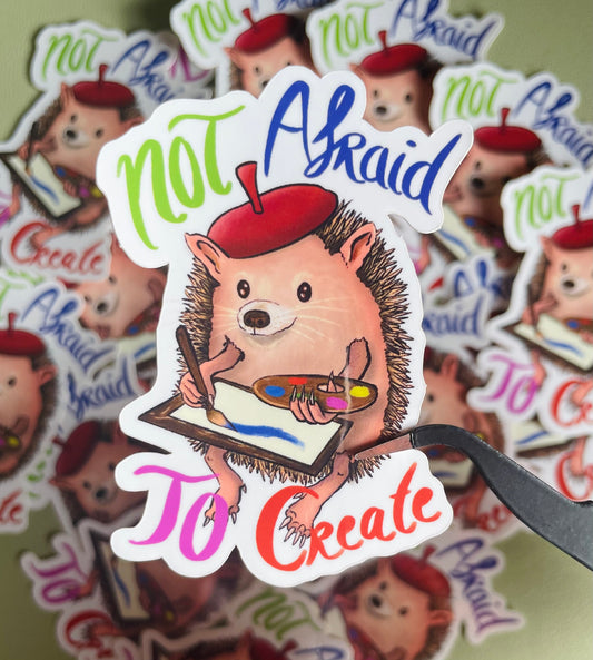 'Not afraid to create' sticker